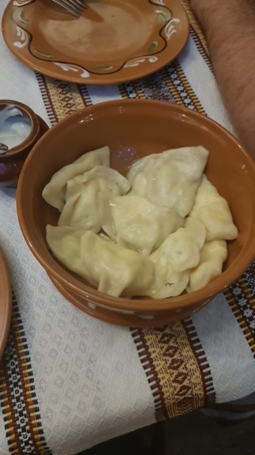 Potato and onion dumplings - sour cream on the side